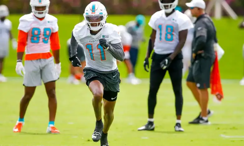 Jun 2, 2022; Miami Gardens, Florida, USA; Miami Dolphins wide receiver Cedrick Wilson Jr. (11) runs on the field during a workout during minicamp at Baptist Health Training Complex. Mandatory Credit: Sam Navarro-USA TODAY Sports - Green Bay Packers