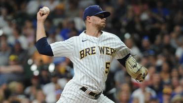 Milwaukee Brewers reliever punches wall, fractures pitching hand