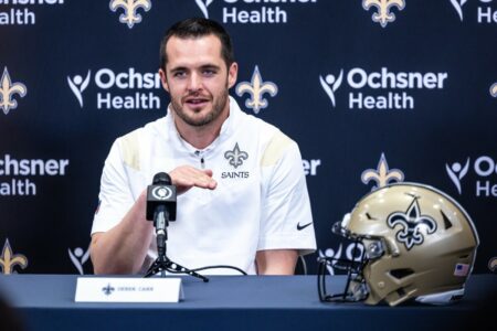 Mar 11, 2023; Metairie, LA, USA; New Orleans Saints quarterback Derek Carr (4) speaks at Ochsner Sports Performance Center. Mandatory Credit: Stephen Lew-USA TODAY Sports