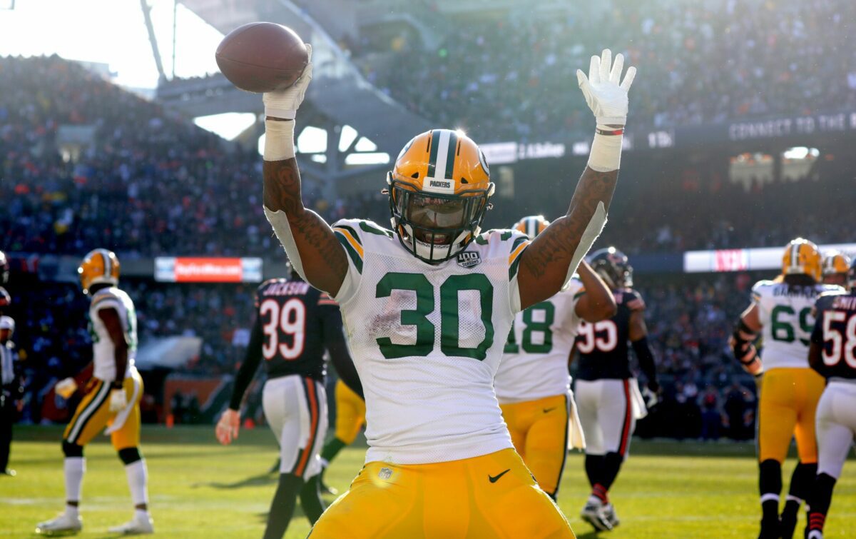 Green Bay Packers running back Jamaal Williams (30) celebrates his touchdown on a 10-yard run during the third quarter of their game against the Chicago Bears Sunday, December 25, 2018 at Soldier Field in Chicago, Ill. The Chicago Bears beat the Green Bay Packers 24-17.