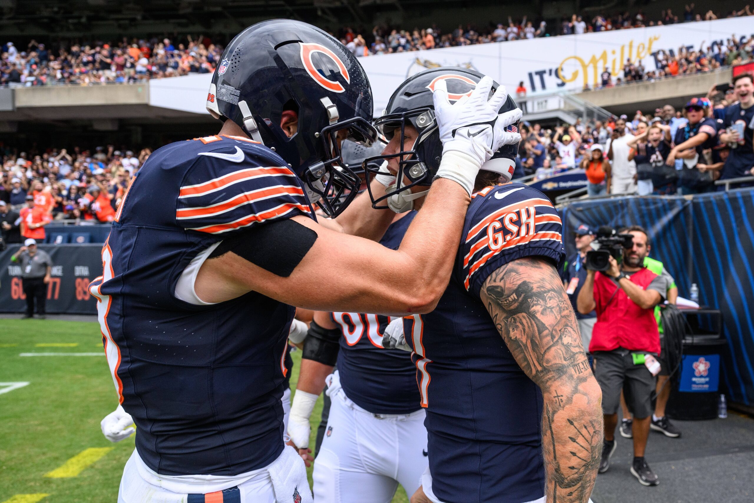 Aug 26, 2023; Chicago, Illinois, USA; Chicago Bears quarterback Tyson Bagent (17) celebrates with tight end Robert Tonyan (18) after scoring a rushing touchdown against the Buffalo Bills during the second quarter at Soldier Field. Mandatory Credit: Daniel Bartel-USA TODAY Sports Packers