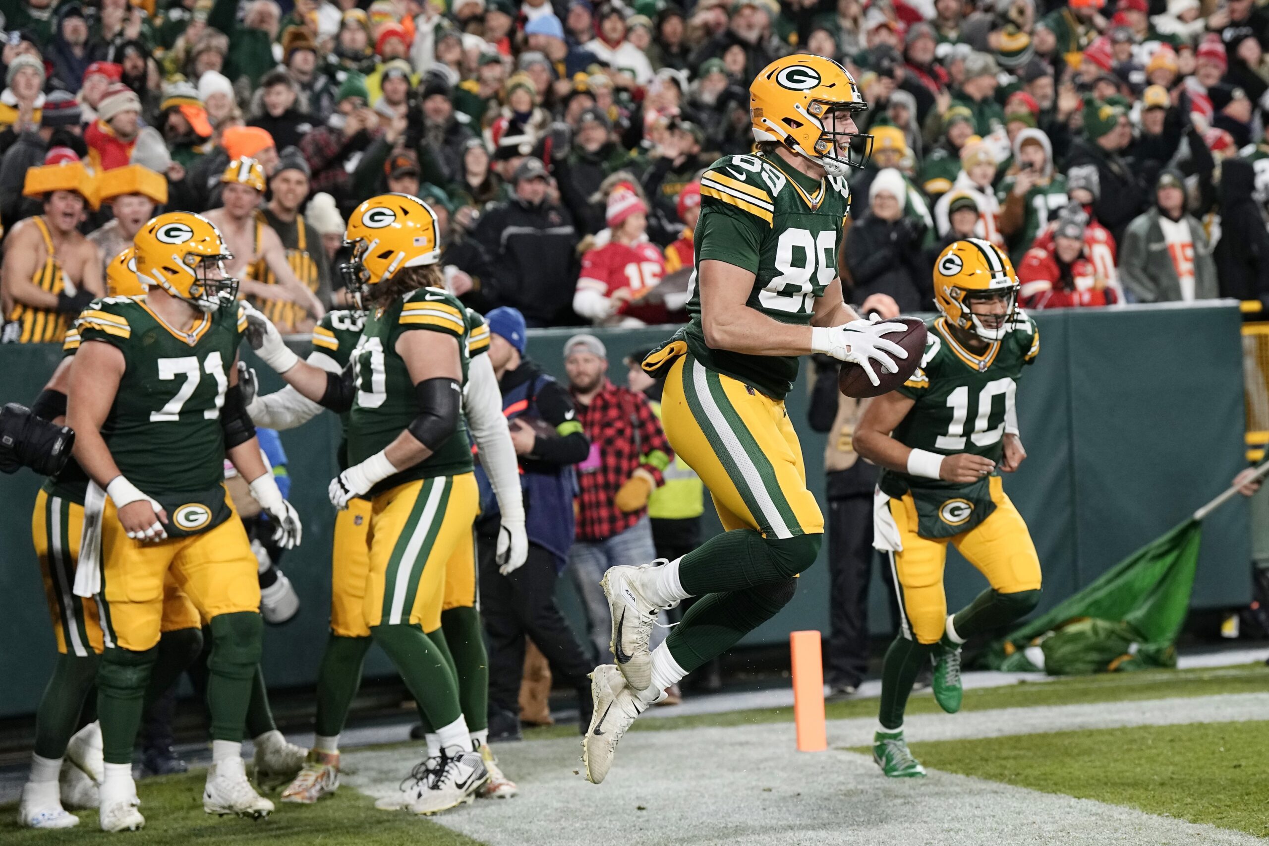 Dec 3, 2023; Green Bay, Wisconsin, USA;  Green Bay Packers tight end Ben Sims (89) celebrates after scoring a touchdown during the first quarter against the Kansas City Chiefs at Lambeau Field. Mandatory Credit: Jeff Hanisch-USA TODAY Sports