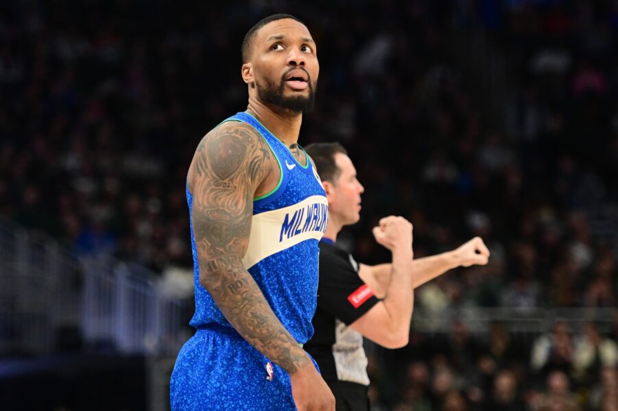 Mar 21, 2024; Milwaukee, Wisconsin, USA; Milwaukee Bucks guard Damian Lillard (0) looks on during a timeout in the fourth quarter against the Brooklyn Nets at Fiserv Forum. Mandatory Credit: Benny Sieu-USA TODAY Sports