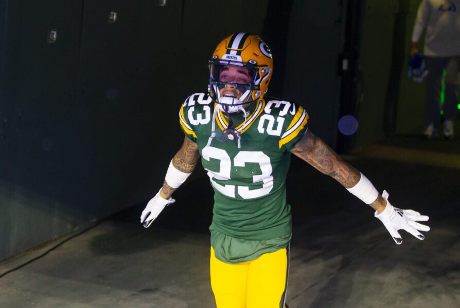 Jan 16, 2021; Green Bay, Wisconsin, USA; Green Bay Packers cornerback Jaire Alexander (23) reacts against the Los Angeles Rams during the NFC Divisional Round at Lambeau Field. Mandatory Credit: Mark J. Rebilas-USA TODAY Sports