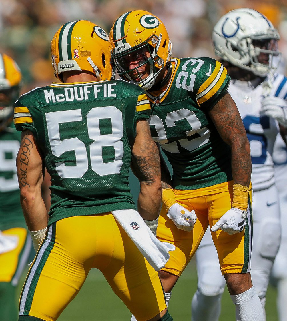 Green Bay Packers cornerback Jaire Alexander (23) celebrates with linebacker Isaiah McDuffie (58) after McDuffie breaks up a pass against the Indianapolis Colts on Sunday, September 15, 2024, at Lambeau Field in Green Bay, Wis. The Packers won the game, 16-10.