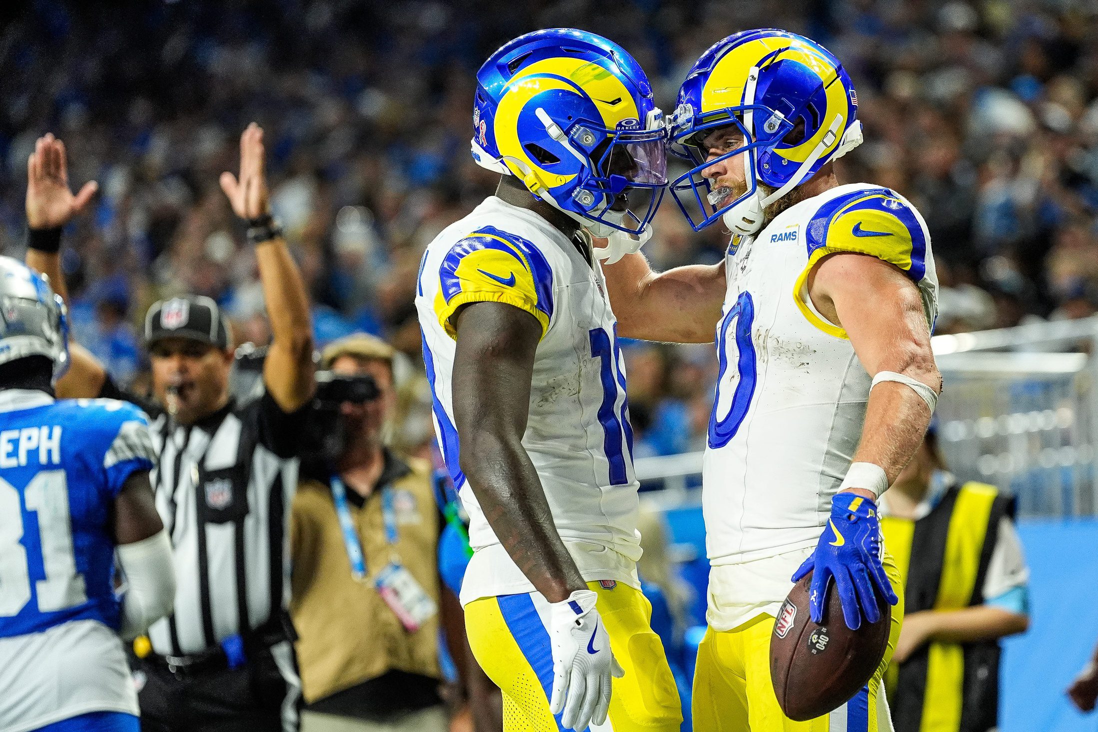 Los Angeles Rams wide receiver Cooper Kupp (10) celebrates a touchdown against with wide receiver Tyler Johnson (18) during the second half at Ford Field in Detroit on Sunday, September 8, 2024. Packers