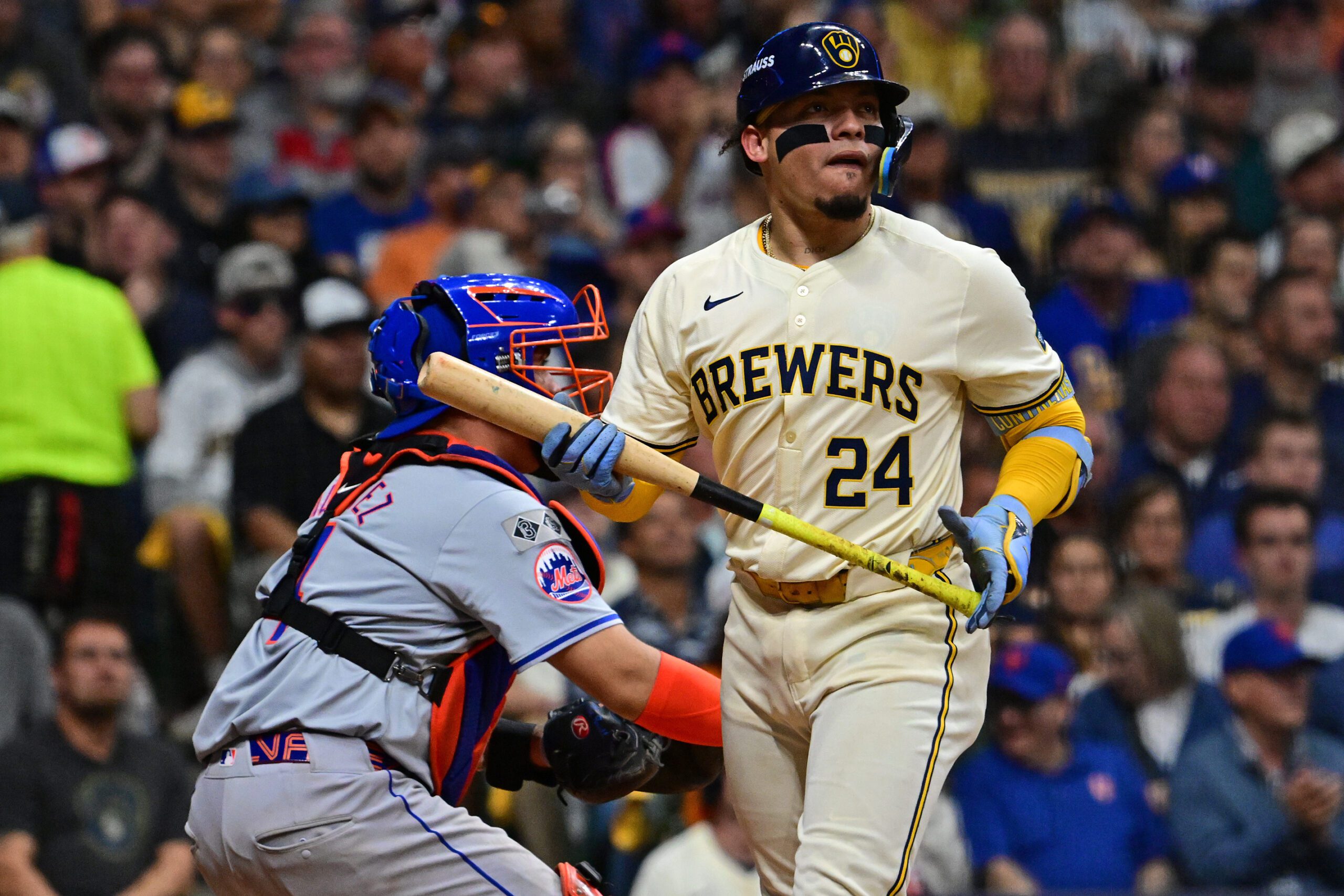 Oct 1, 2024; Milwaukee, Wisconsin, USA; Milwaukee Brewers catcher William Contreras (24) reacts after striking out against the New York Mets during the seventh inning in game one of the Wildcard round for the 2024 MLB Playoffs at American Family Field. Mandatory Credit: Benny Sieu-Imagn Images