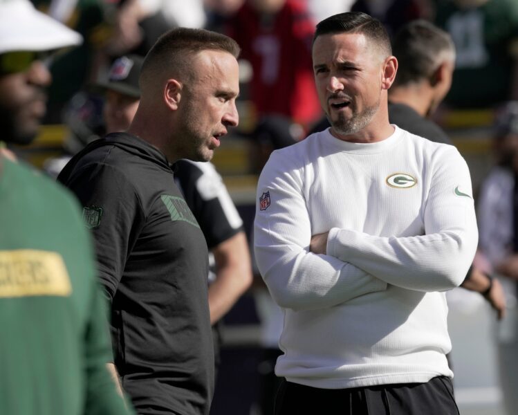 Green Bay Packers defensive coordinator Jeff Hafley, left, talks with head coach Matt LaFleur before their game against the Houston Texans Sunday, October 20, 2024 at Lambeau Field in Green Bay, Wisconsin.