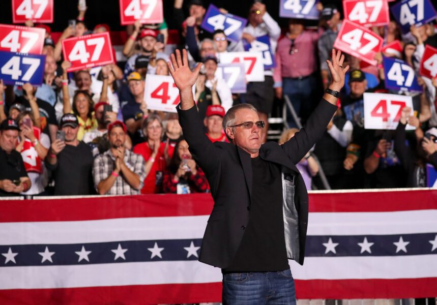 Former Green Bay Packers quarterback Brett Favre takes the stage during a campaign rally for Republican presidential nominee Donald Trump on Wednesday, October 30, 2024, at the Resch Center in Ashwaubenon, Wis. Tork Mason/USA TODAY NETWORK-Wisconsin