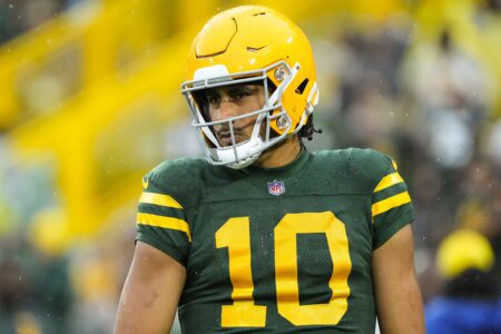 Nov 3, 2024; Green Bay, Wisconsin, USA; Green Bay Packers quarterback Jordan Love (10) looks on during warmups prior to the game against the Detroit Lions at Lambeau Field. Mandatory Credit: Jeff Hanisch-Imagn Images