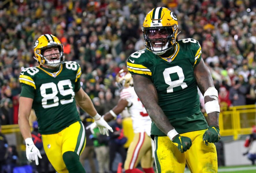 Green Bay Packers running back Josh Jacobs (8) celebrates scoring a touchdown in the third quarter against the San Francisco 49ers during their football game Sunday, November 24, 2024, at Lambeau Field in Green Bay, Wisconsin. © Dan Powers/USA TODAY NETWORK-Wisconsin / USA TODAY NETWORK via Imagn Images