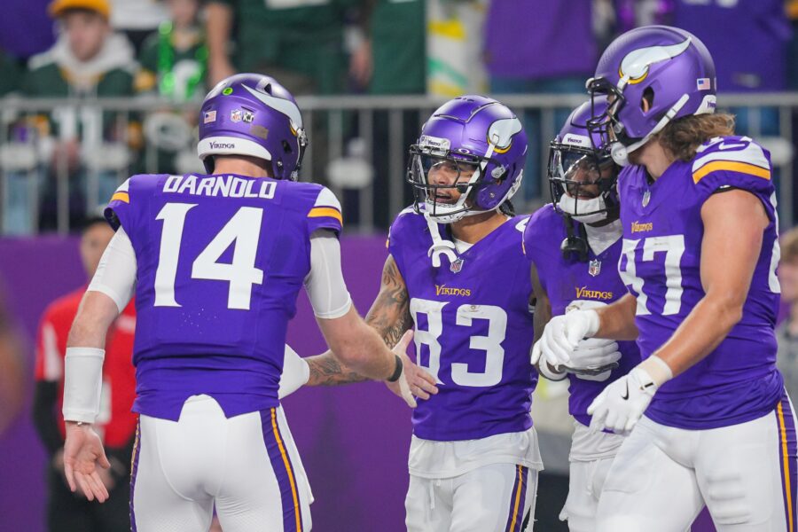 Minnesota Vikings wide receiver Jalen Nailor (83) celebrating his touchdown with quarterback Sam Darnold (14)