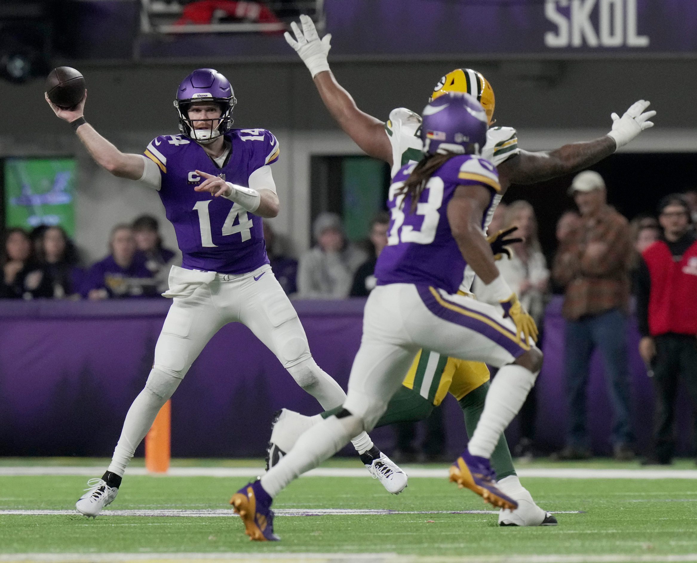 Minnesota Vikings quarterback Sam Darnold (14) throws a pass during the third quarter of their game Sunday, December 29, 2024 at U.S. Bank Stadium in Minneapolis, Minnesota. The Minnesota Vikings beat the Green Bay Packers 27-25.