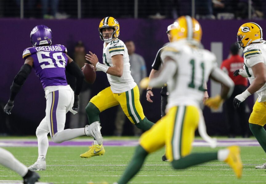 Green Bay Packers quarterback Jordan Love (10) looks to pass the ball against the Minnesota Vikings in the third quarter during their football game Sunday, December 29, 2024, at U.S. Bank Stadium in Minneapolis, Minnesota.