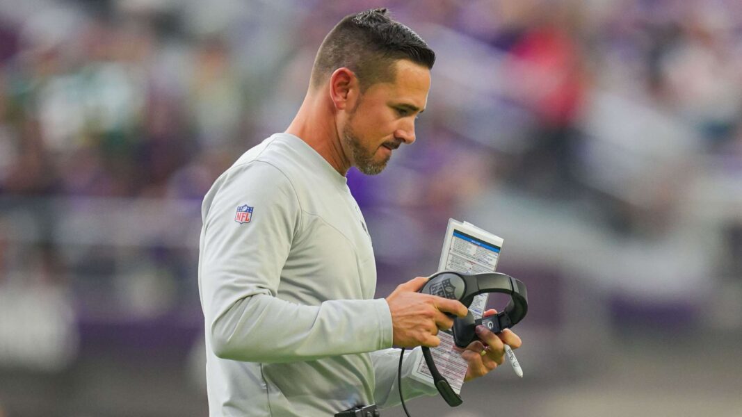 Sep 11, 2022; Minneapolis, Minnesota, USA; Green Bay Packers head coach Matt LaFleur walks back to the sideline against the Minnesota Vikings in the fourth quarter at U.S. Bank Stadium. Mandatory Credit: Brad Rempel-Imagn Images