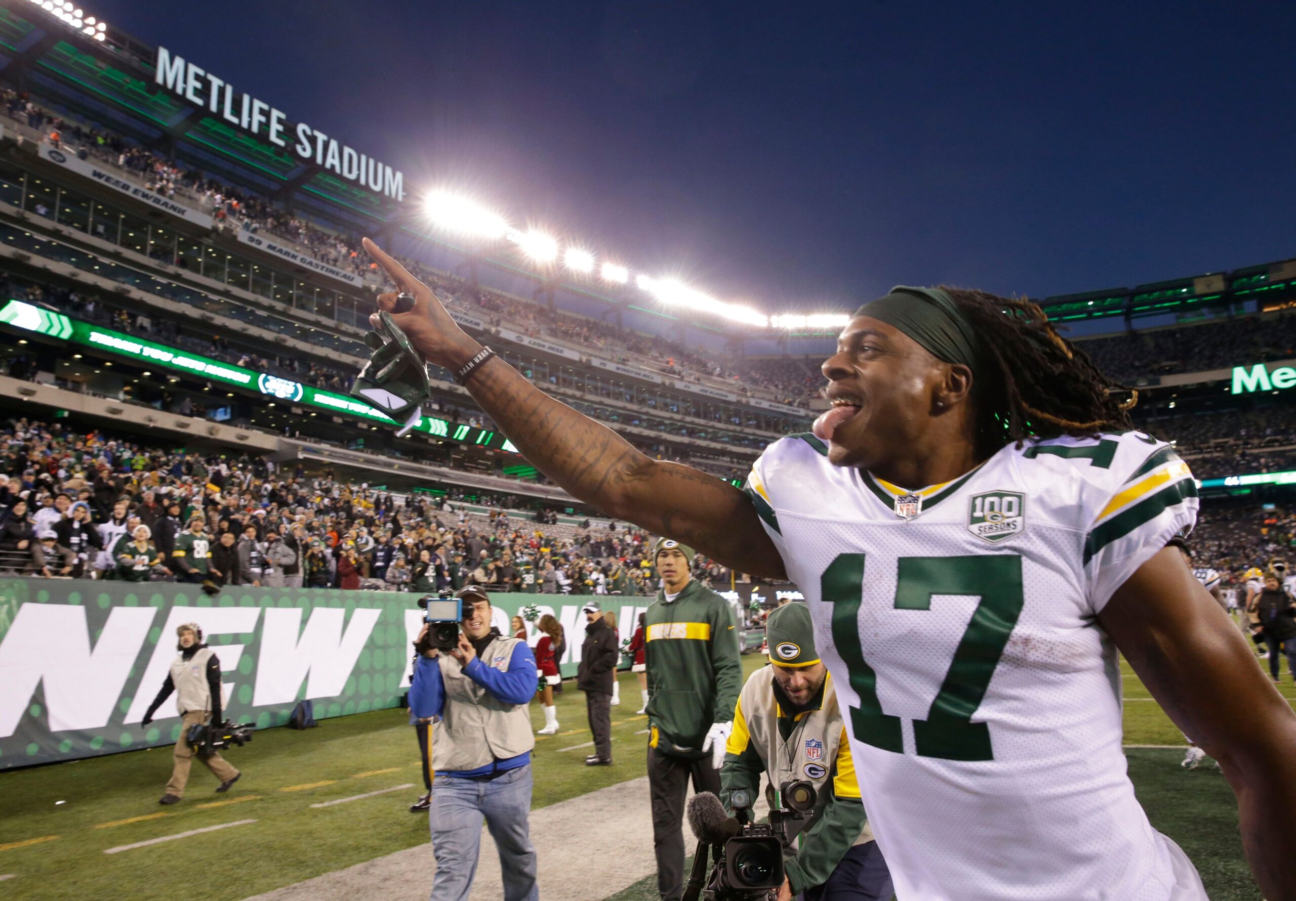 Green Bay Packers' Davante Adams responds to the fans after the Packers 44-38 overtime win against the New York Jets on Dec. 23 at MetLife Stadium  in East Rutherford, New Jersey.