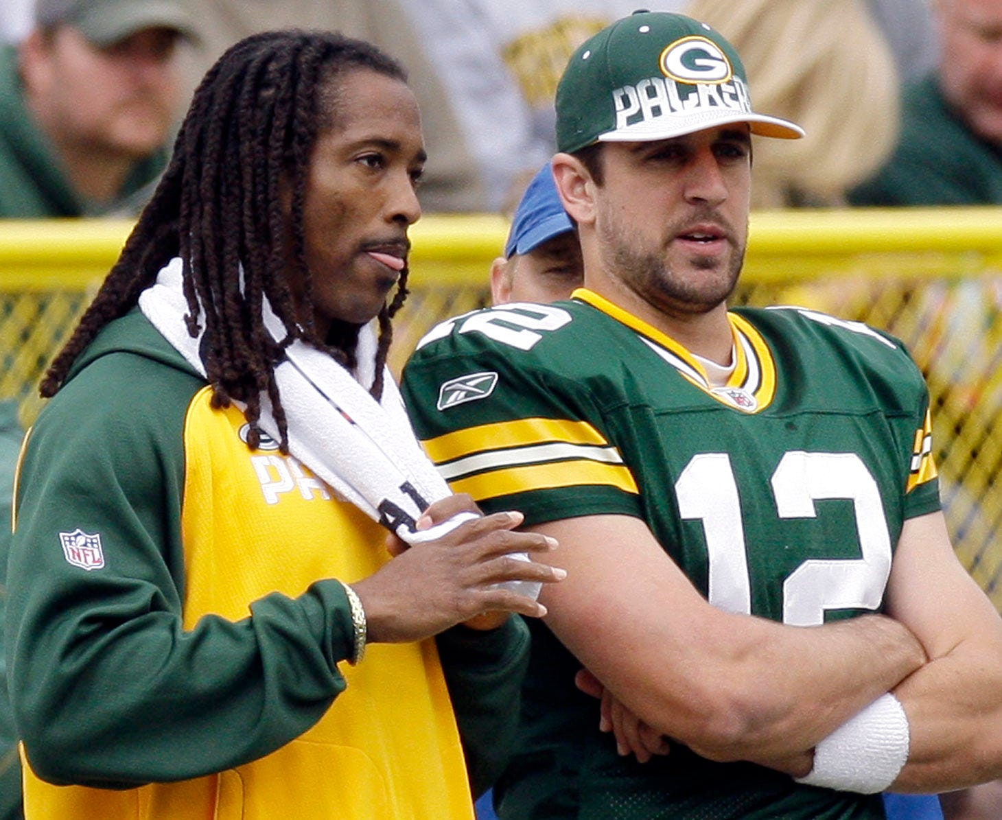 Green Bay Packers cornerback Al Harris (left) talks with quarterback Aaron Rodgers during the second quarter of their game against the Buffalo Bills on Sept. 19, 2010, at Lambeau Field.