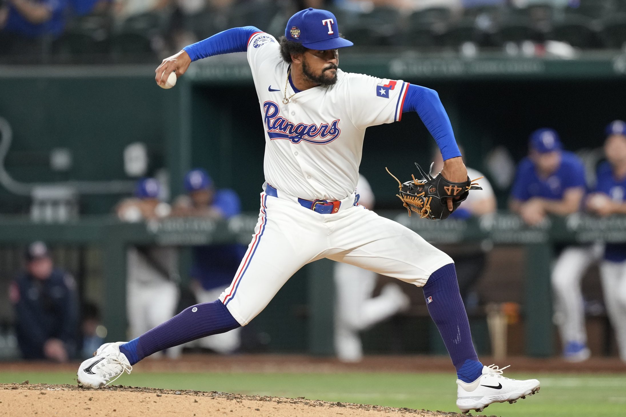 Apr 24, 2024; Arlington, Texas, USA; Texas Rangers relief pitcher Grant Anderson (65) pitches to the Seattle Mariners during the ninth inning at Globe Life Field. Mandatory Credit: Jim Cowsert-Imagn Images