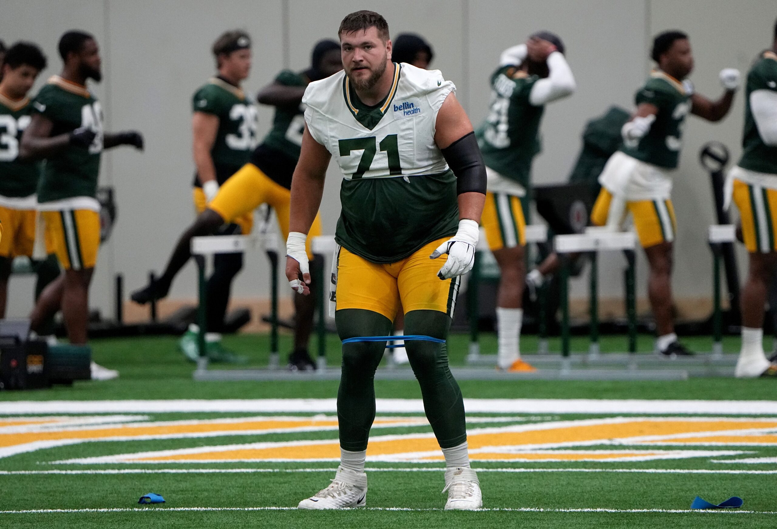 Jun 11, 2024; Green Bay, WI, USA; Green Bay Packers center Josh Myers (71) exercises during minicamp. Mandatory Credit: Mark Hoffman-Imagn Images