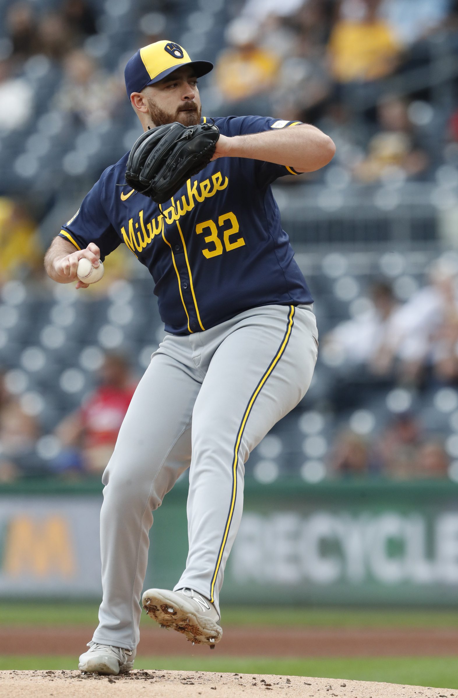 Sep 26, 2024; Pittsburgh, Pennsylvania, USA; Milwaukee Brewers starting pitcher Aaron Civale (32) delivers a pitch against the Pittsburgh Pirates during the first inning at PNC Park. Mandatory Credit: Charles LeClaire-Imagn Images