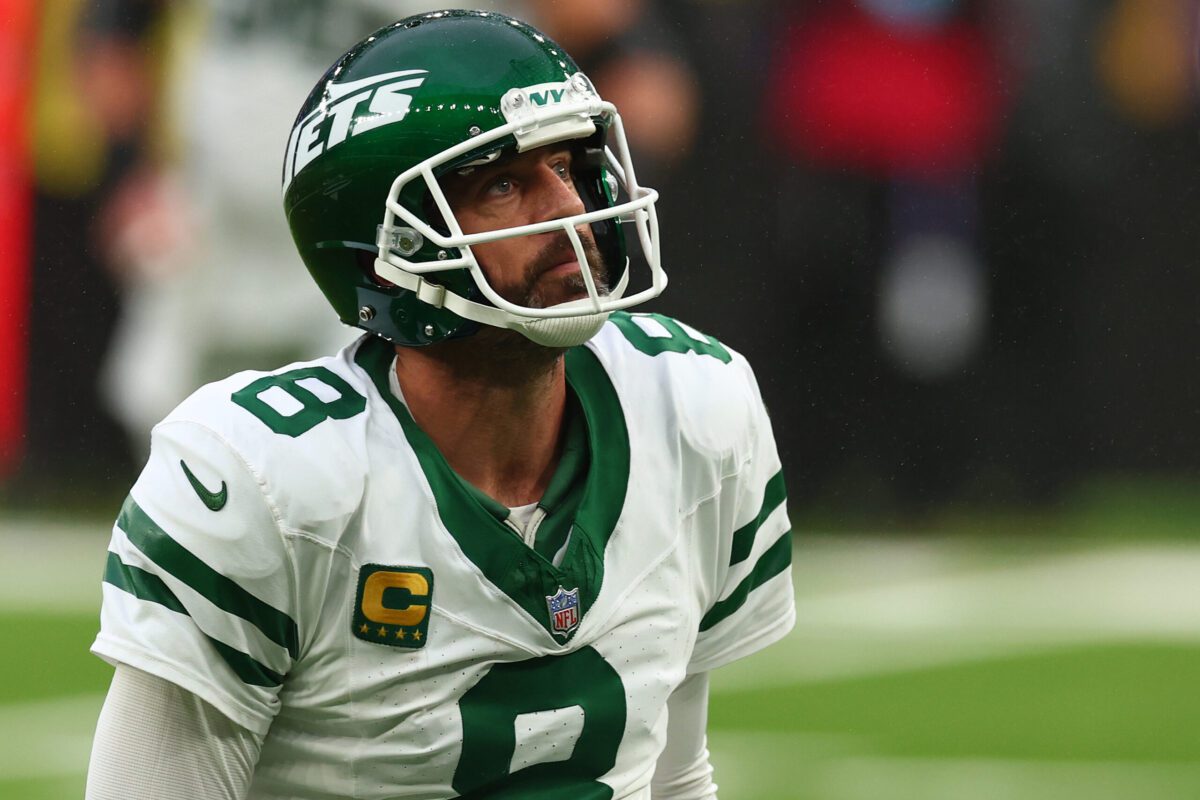 Oct 6, 2024; Tottenham, ENG; New York Jets Quarterback Aaron Rodgers (8) reacts after his pass is incomplete in the 3rd Quarter against Minnesota Vikings at Tottenham Hotspur Stadium. Mandatory Credit: Shaun Brooks-Imagn Images