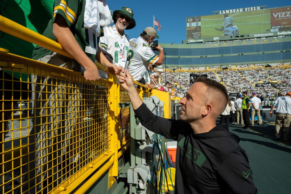 Green Bay Packers defensive coordinator Jeff Hafley talks with fans before their game against the Houston Texans Sunday, October 20, 2024 at Lambeau Field in Green Bay, Wisconsin. © Mark Hoffman/Milwaukee Journal Sentinel / USA TODAY NETWORK via Imagn Images