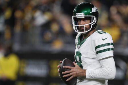 Oct 20, 2024; Pittsburgh, Pennsylvania, USA; New York Jets quarterback Aaron Rodgers (8) warms up before the game against the Pittsburgh Steelers at Acrisure Stadium. Mandatory Credit: Charles LeClaire-Imagn Images