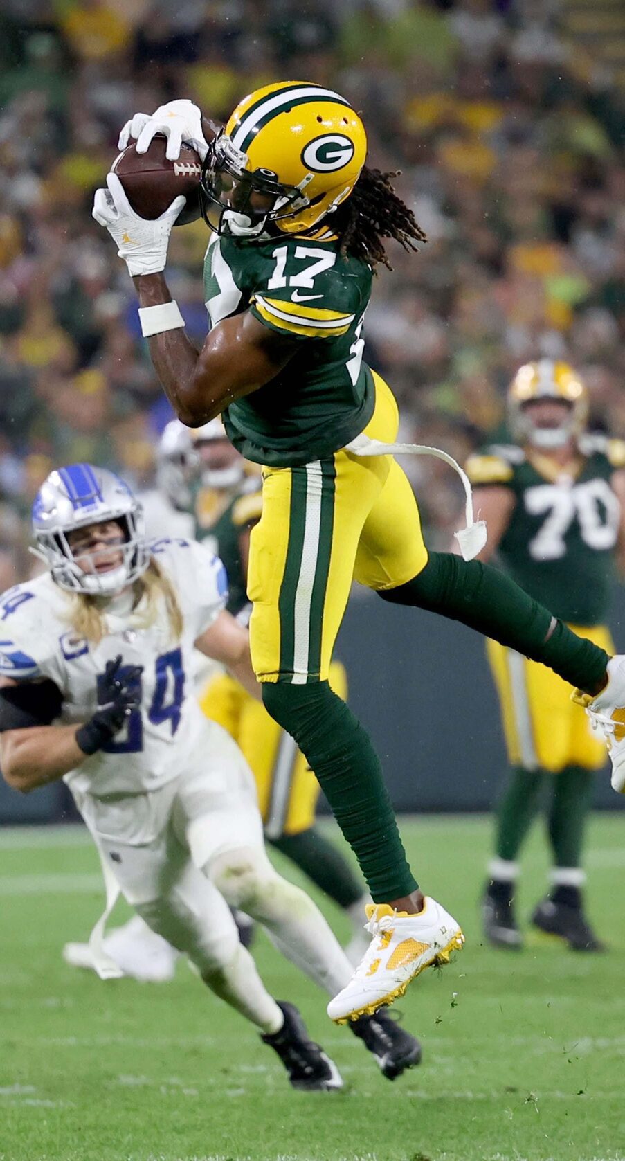 Green Bay Packers wide receiver Davante Adams (17) hauls in a pass during third quarter of the Green Bay Packers game against the Detroit Lions at Lambeau Field in Green Bay on Monday, Sept. 20, 2021. The Packers won 35-17.