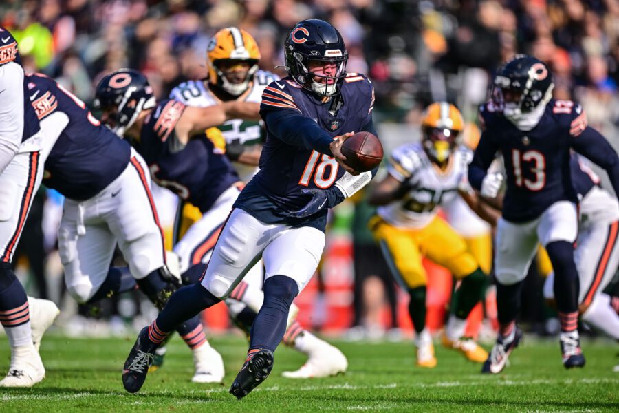 Nov 17, 2024; Chicago, Illinois, USA; Chicago Bears quarterback Caleb Williams (18) fakes a hand off against the Green Bay Packers during the first quarter at Soldier Field. Mandatory Credit: Daniel Bartel-Imagn Images