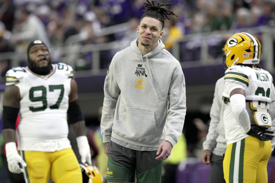 Dec 29, 2024; Minneapolis, Minnesota, USA; Injured Green Bay Packers wide receiver Christian Watson is shown before their game against the Minnesota Vikings at U.S. Bank Stadium. Mandatory Credit: Mark Hoffman/USA TODAY NETWORK-Wisconsin via Imagn Images