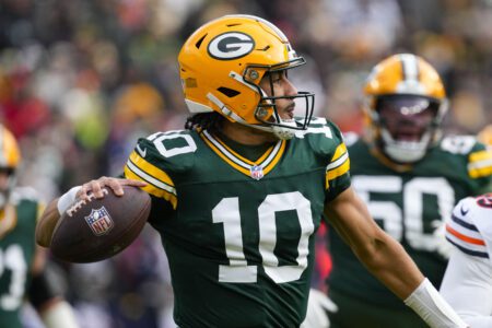 Jan 5, 2025; Green Bay, Wisconsin, USA; Green Bay Packers quarterback Jordan Love (10) throws a pass during the first quarter against the Chicago Bears at Lambeau Field. Mandatory Credit: Jeff Hanisch-Imagn Images