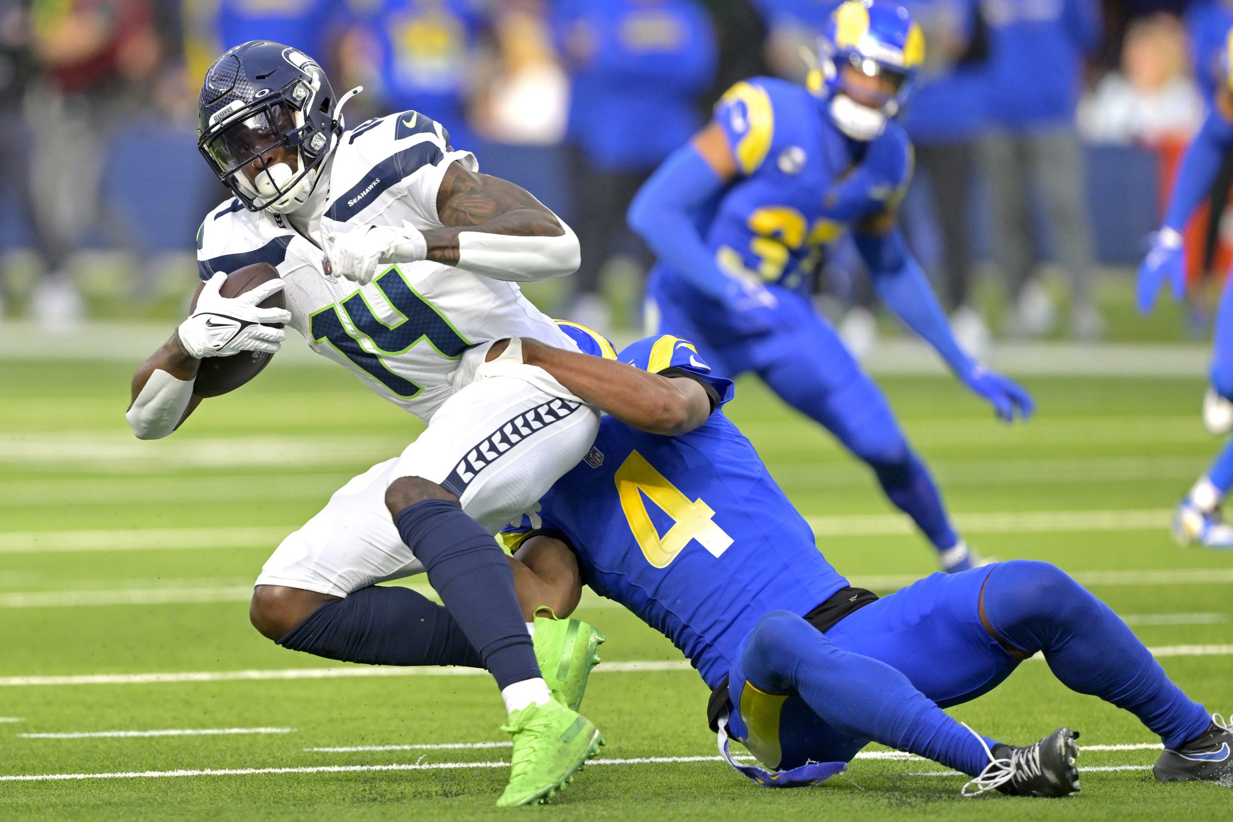 Green Bay Packers, DK MetcalfJan 5, 2025; Inglewood, California, USA; Seattle Seahawks wide receiver DK Metcalf (14) is stopped by Los Angeles Rams cornerback Ahkello Witherspoon (4) after a complete pass in the first half at SoFi Stadium. Mandatory Credit: Jayne Kamin-Oncea-Imagn Images