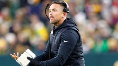 Nov 28, 2021; Green Bay, Wisconsin, USA; Green Bay Packers head coach Matt LaFleur reacts to a call during the second quarter against the Los Angeles Rams at Lambeau Field. Mandatory Credit: Jeff Hanisch-Imagn Images