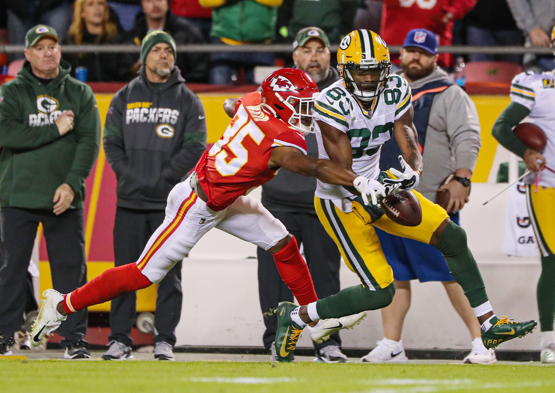 Oct 27, 2019; Kansas City, MO, USA; Kansas City Chiefs cornerback Charvarius Ward (35) breaks up a pass intended for Green Bay Packers wide receiver Marquez Valdes-Scantling (83) during the second half at Arrowhead Stadium. Mandatory Credit: Jay Biggerstaff-Imagn Images