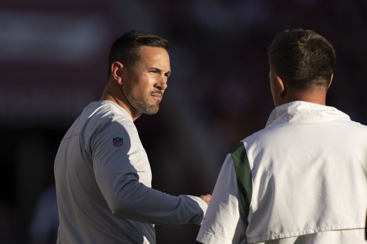 August 12, 2022; Santa Clara, California, USA; Green Bay Packers head coach Matt LaFleur talks to a coach against the San Francisco 49ers during the second quarter at Levi's Stadium. Mandatory Credit: Kyle Terada-Imagn Images