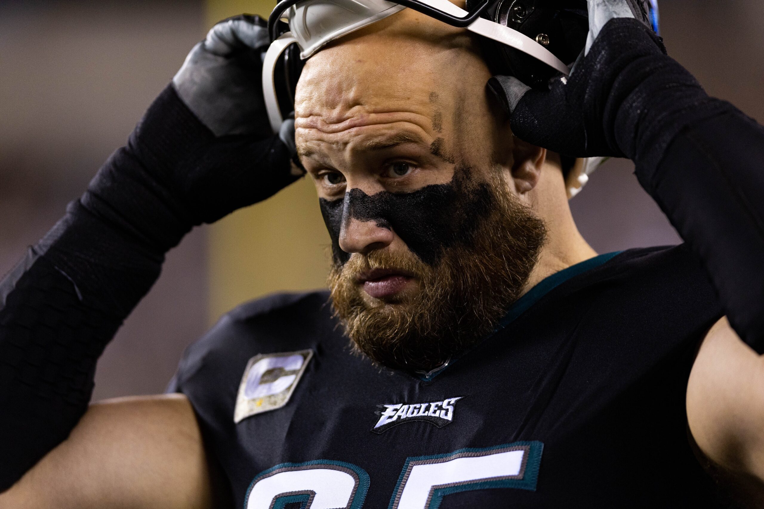 Nov 27, 2022; Philadelphia, Pennsylvania, USA; Philadelphia Eagles offensive tackle Lane Johnson (65) on the sideline against the Green Bay Packers at Lincoln Financial Field. Mandatory Credit: Bill Streicher-Imagn Images