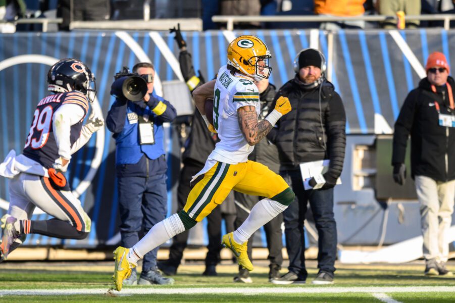 Dec 4, 2022; Chicago, Illinois, USA; Green Bay Packers wide receiver Christian Watson (9) runs for a touchdown in the fourth quarter against the Chicago Bears at Soldier Field. Mandatory Credit: Daniel Bartel-Imagn Images