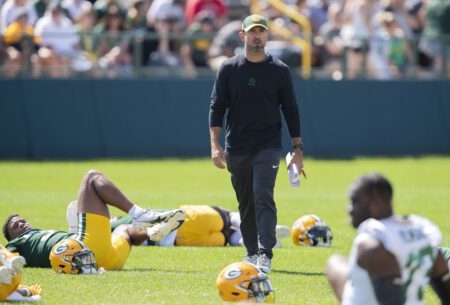 Jul 29, 2023; Green Bay, Wisconsin, USA; Green Bay Packers head coach Matt LaFleur surveys the field while the team stretches during practice at Ray Nitschke Field. Mandatory Credit: Tork Mason-Imagn Images