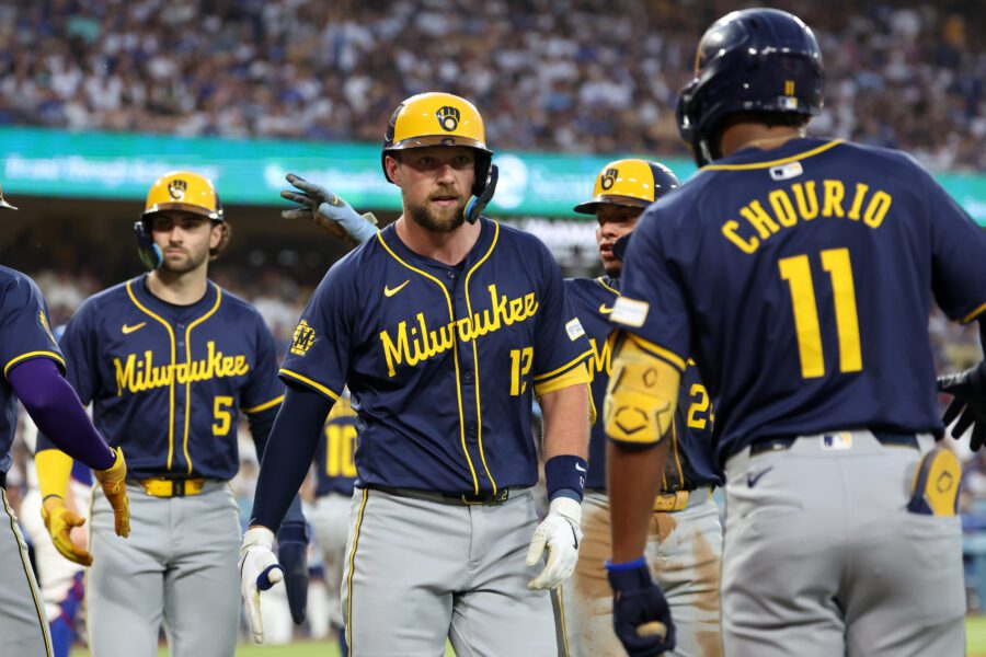 Milwaukee Brewers first baseman Rhys Hoskins and Jackson Chourio