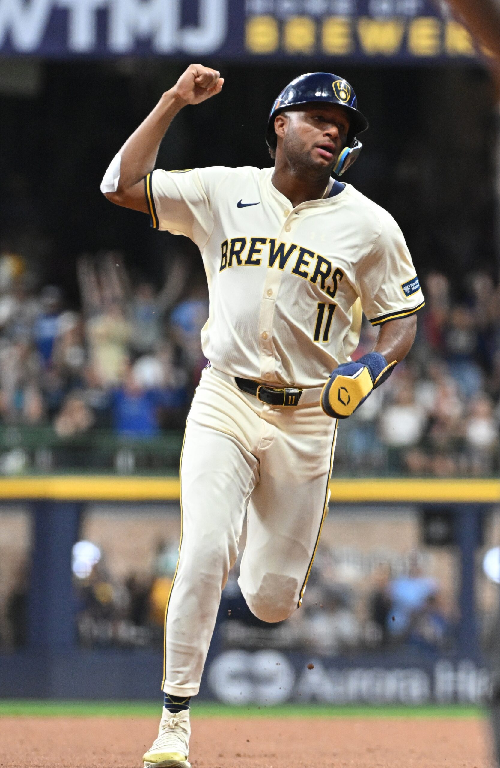 Aug 12, 2024; Milwaukee, Wisconsin, USA; Milwaukee Brewers outfielder Jackson Chourio (11) celebrates Milwaukee Brewers catcher William Contreras (24) home run in the sixth inning at American Family Field. Mandatory Credit: Michael McLoone-Imagn Images