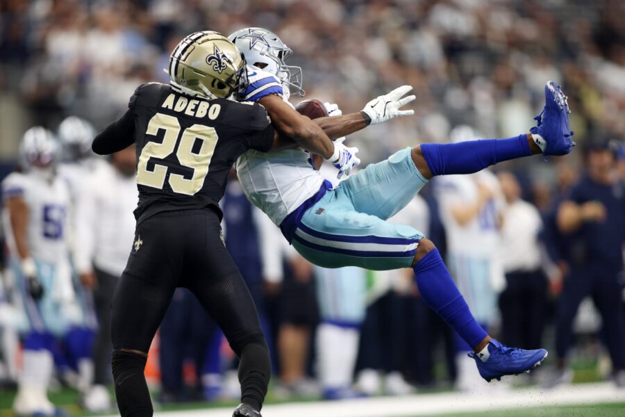 Jalen Tolbert (1) catches a pass against New Orleans Saints cornerback Paulson Adebo (29)