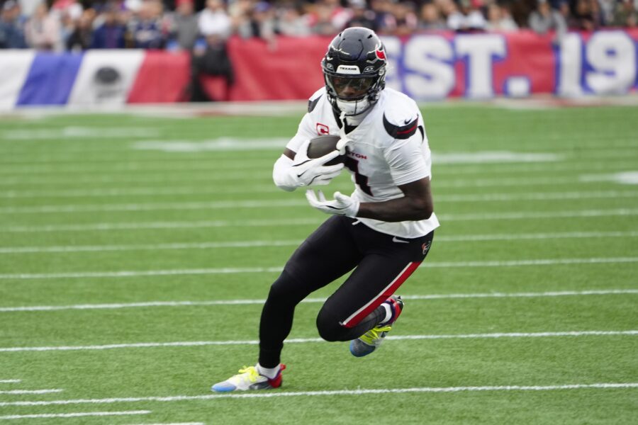 Oct 13, 2024; Foxborough, Massachusetts, USA; Houston Texans wide receiver Stefon Diggs (1) runs with the ball after making a catch against the New England Patriots during the first half at Gillette Stadium. Mandatory Credit: Gregory Fisher-Imagn Images Packers