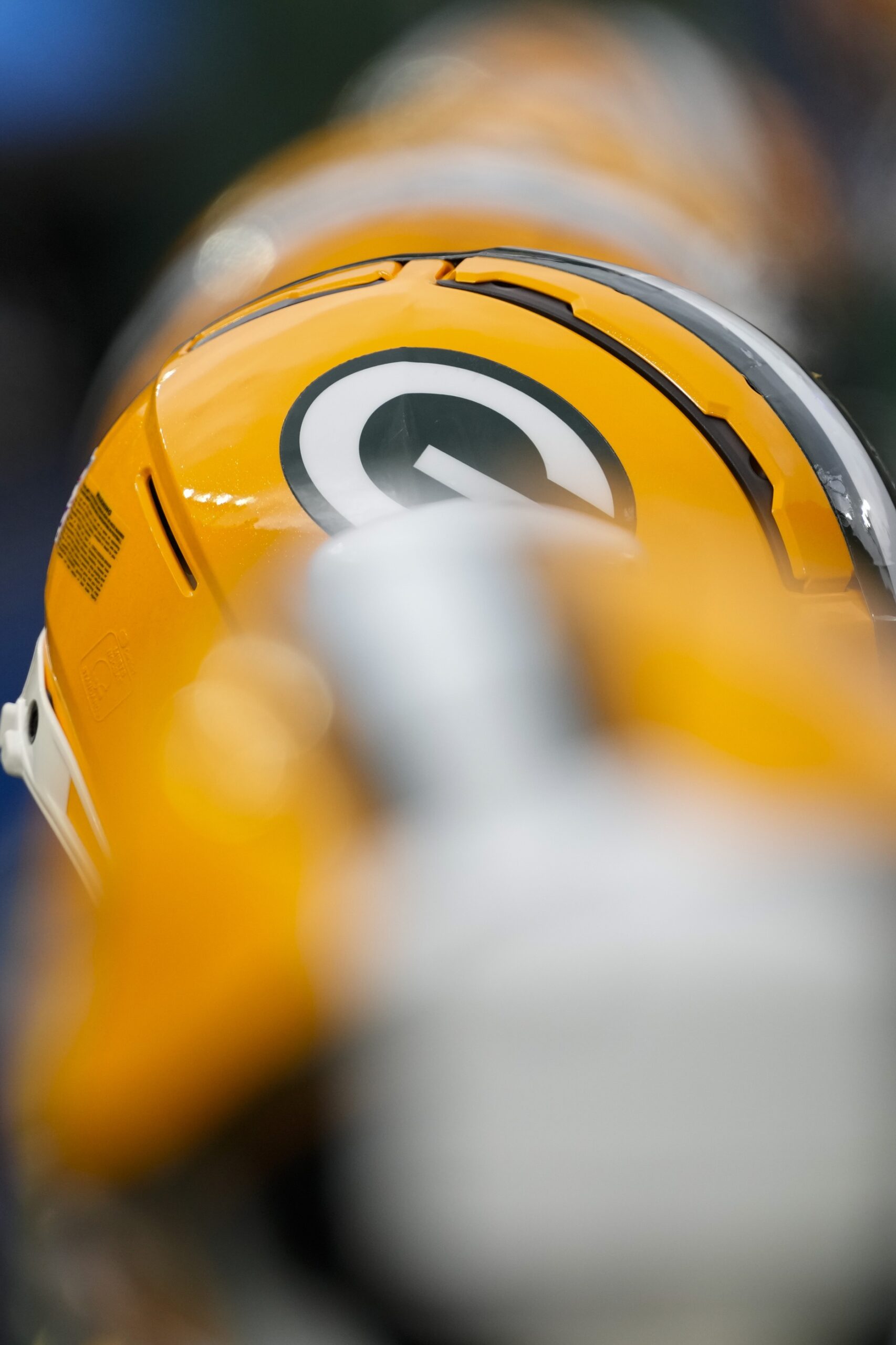 Oct 13, 2024; Green Bay, Wisconsin, USA; General view of Green Bay Packers helmets during the game against the Arizona Cardinals at Lambeau Field. Mandatory Credit: Jeff Hanisch-Imagn Images