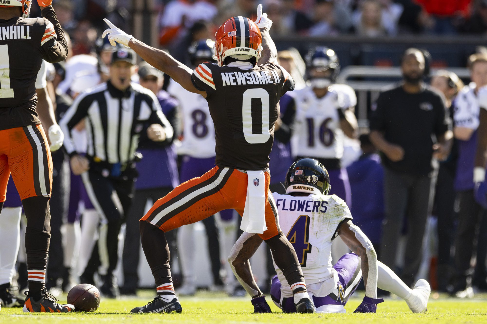 Oct 27, 2024; Cleveland, Ohio, USA; Cleveland Browns cornerback Greg Newsome II (0) celebrates breaking up a pass intended for Baltimore Ravens wide receiver Zay Flowers (4) during the second quarter at Huntington Bank Field. Mandatory Credit: Scott Galvin-Imagn Images Packers