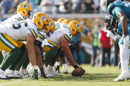 Green Bay Packers center Josh Myers (71) and the offensive line line up for the snap