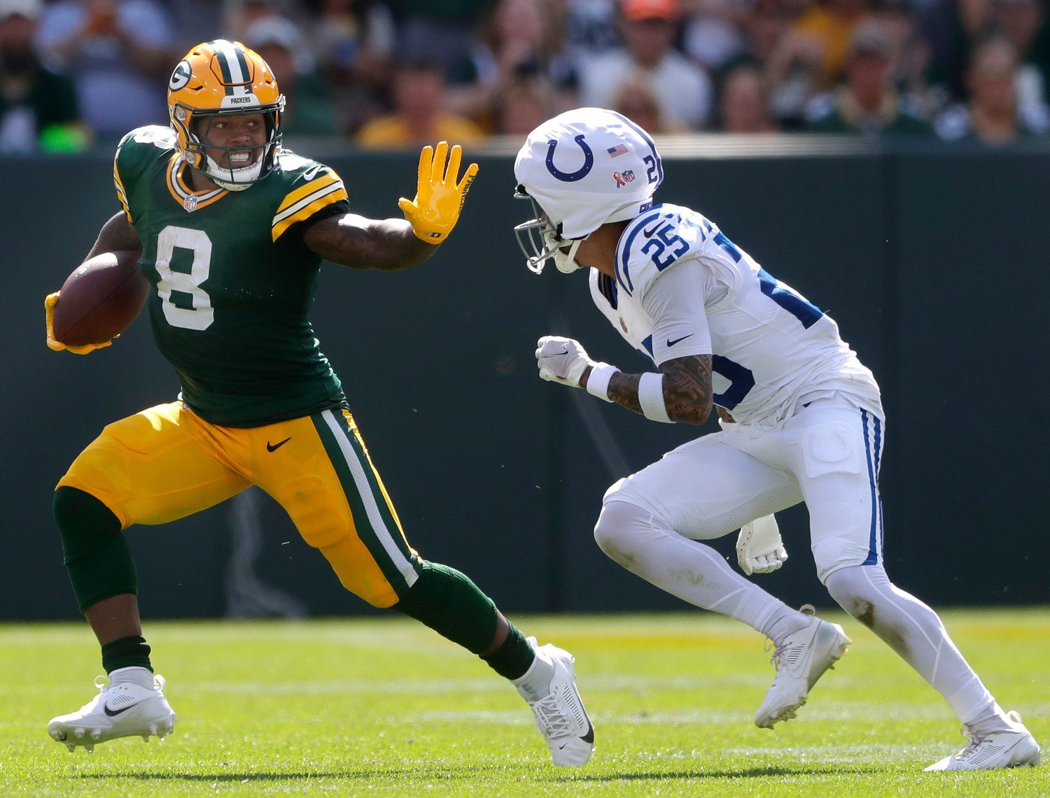 Green Bay Packers running back Josh Jacobs (8) against Indianapolis Colts safety Rodney Thomas II (25) on Sept. 15, 2024, at Lambeau Field in Green Bay. © Wm. Glasheen/USA TODAY Network / USA TODAY NETWORK via Imagn Images