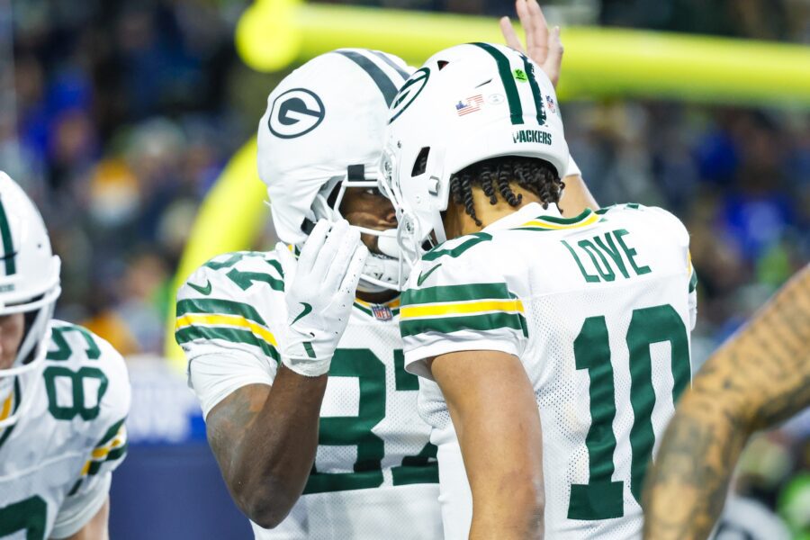 Dec 15, 2024; Seattle, Washington, USA; Green Bay Packers wide receiver Romeo Doubs (87) celebrates with Green Bay Packers quarterback Jordan Love (10) following a touchdown pass against the Seattle Seahawks during the fourth quarter at Lumen Field. Mandatory Credit: Joe Nicholson-Imagn Images