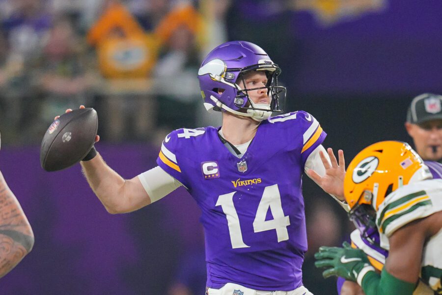 Dec 29, 2024; Minneapolis, Minnesota, USA; Minnesota Vikings quarterback Sam Darnold (14) passes against Green Bay Packers in the second quarter at U.S. Bank Stadium. Mandatory Credit: Brad Rempel-Imagn Images