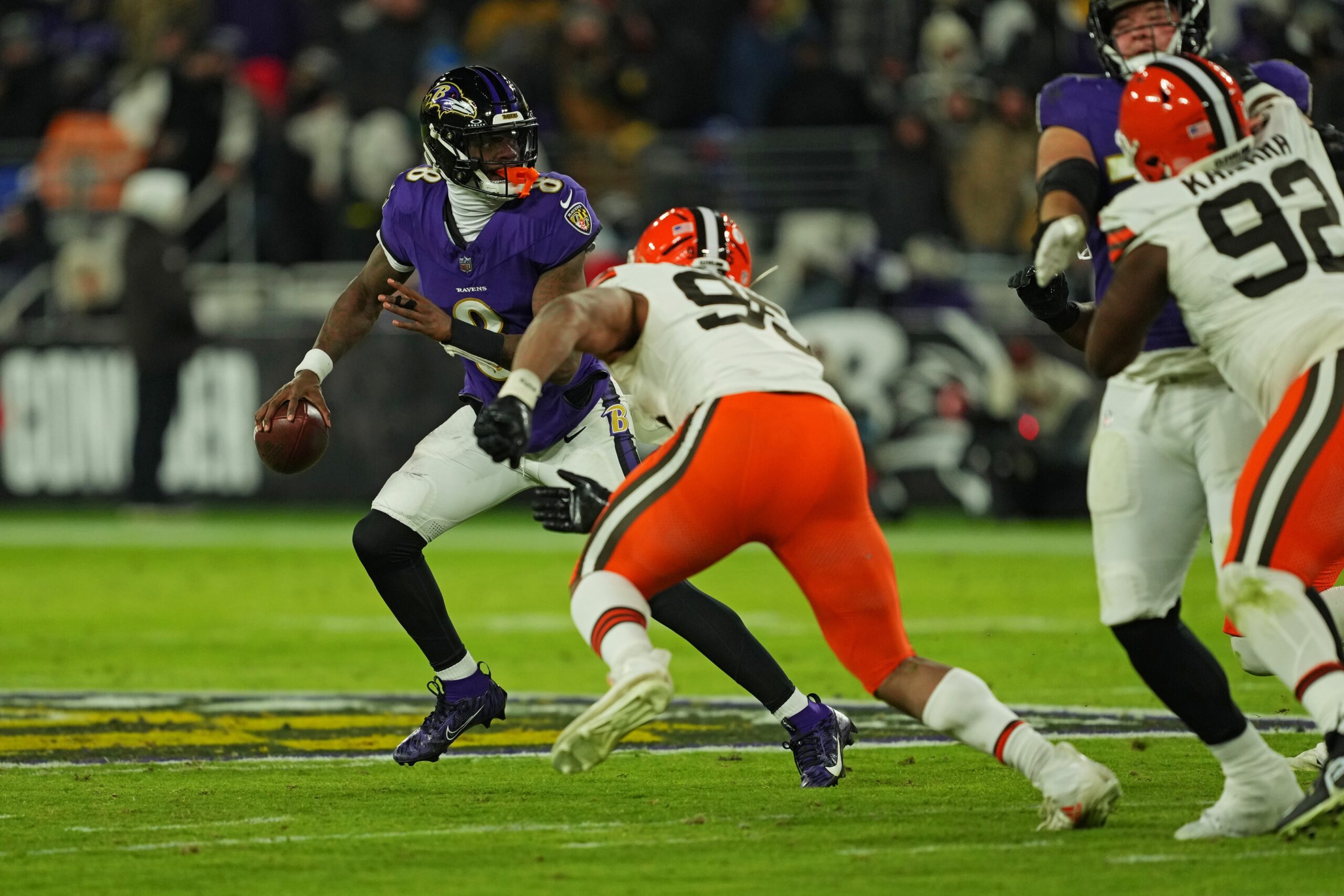 Green Bay Packers Myles Garrett, Cleveland BrownsJan 4, 2025; Baltimore, Maryland, USA; Baltimore Ravens quarterback Lamar Jackson (8) runs the ball during the second quarter against Cleveland Browns defensive end Myles Garrett (95) at M&T Bank Stadium. Mandatory Credit: Mitch Stringer-Imagn Images