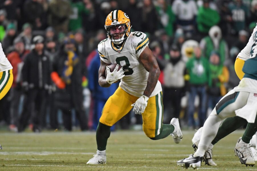 Jan 12, 2025; Philadelphia, Pennsylvania, USA; Green Bay Packers running back Josh Jacobs (8) against the Philadelphia Eagles in an NFC wild card game at Lincoln Financial Field. Mandatory Credit: Eric Hartline-Imagn Images